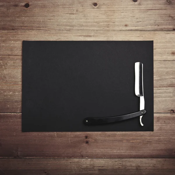 Rasiermesser des Friseursalons mit schwarzem Hintergrund — Stockfoto