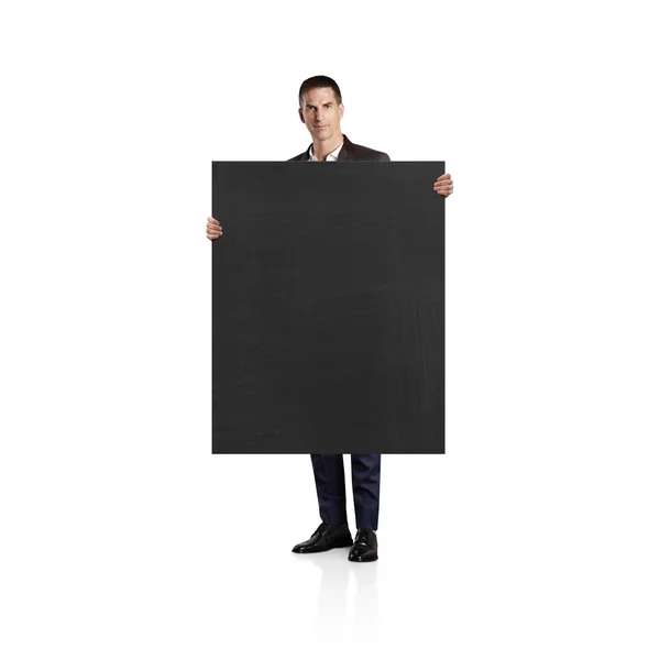Businessman holding blackboard — Stock Photo, Image
