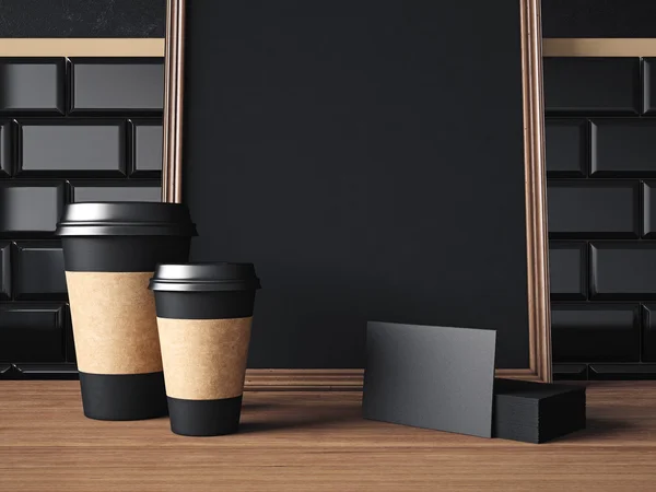 Table with black elements and poster — Stock Photo, Image