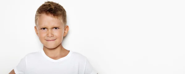 Mockup of angry young boy on the white background — Stock Photo, Image