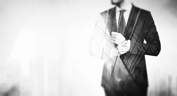 BW double exposure of young business man in the skyscraper on a background — Stock Photo, Image