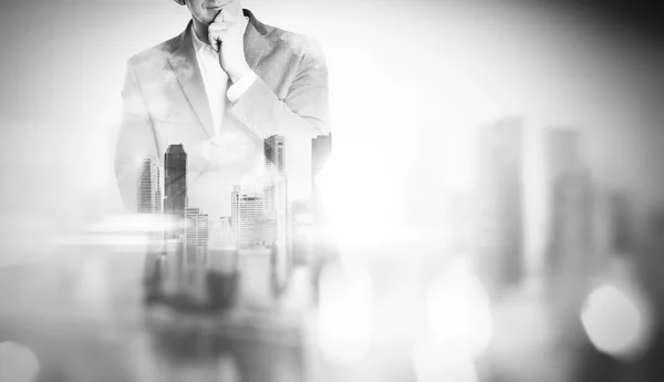 Double exposure of city and young business man — Stock Photo, Image