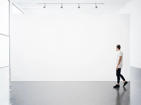 Empty interior and young man — Stock Photo, Image