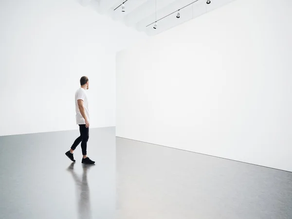 man walks on the exhibition hall