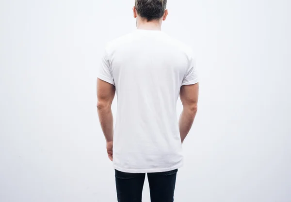 Man klädd i t-shirt och Blå jeans — Stockfoto