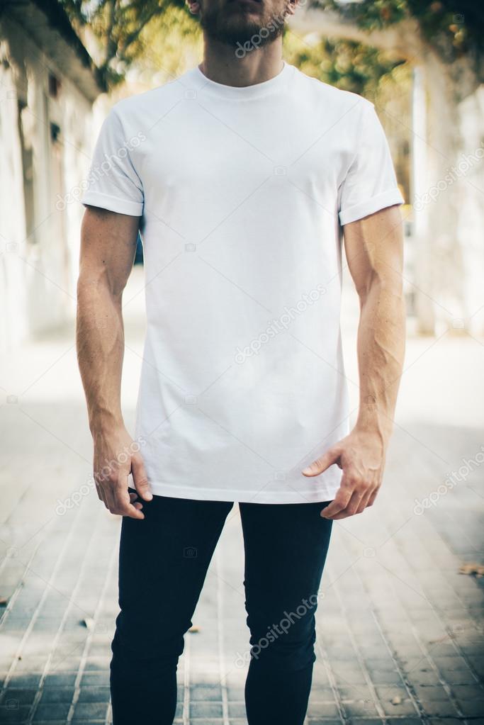 man wearing blank t-shirt and jeans