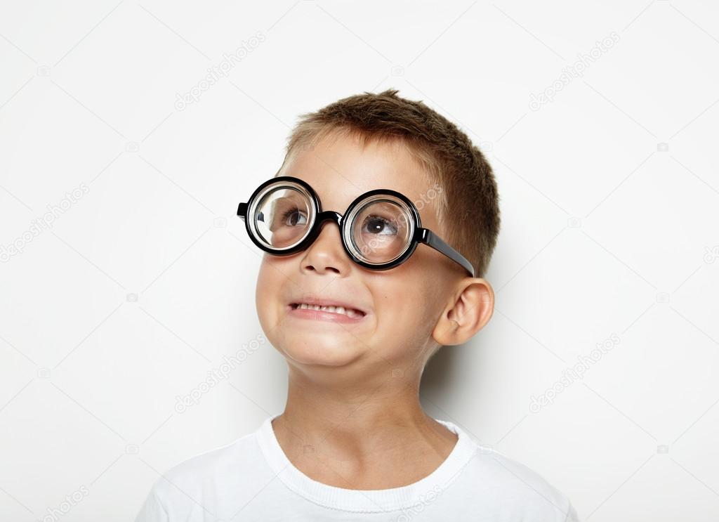 surprised little boy with glasses