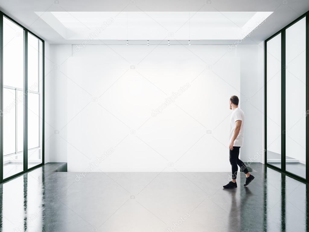 man walks on the exhibition hall
