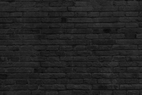 Parte vazia da parede de tijolo preto — Fotografia de Stock