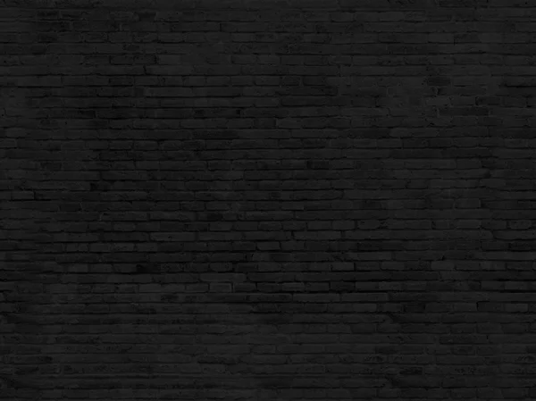 Parte vazia da parede de tijolo pintada de preto . — Fotografia de Stock