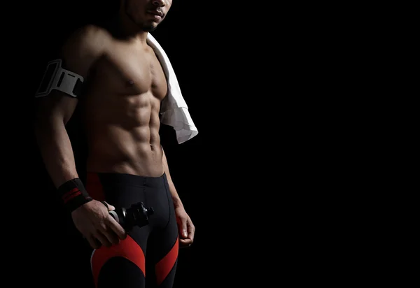 Athletic man on black background — Stock Photo, Image