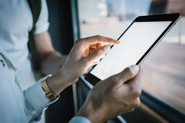 Man and young woman holding in hands their gadgets.  Visual effects. — Stockfoto