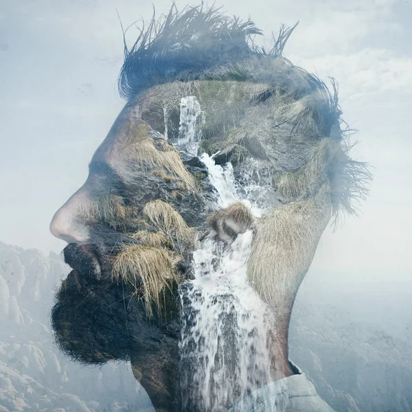 Double exposure portrait of a man into the wild nature — Stock Photo, Image