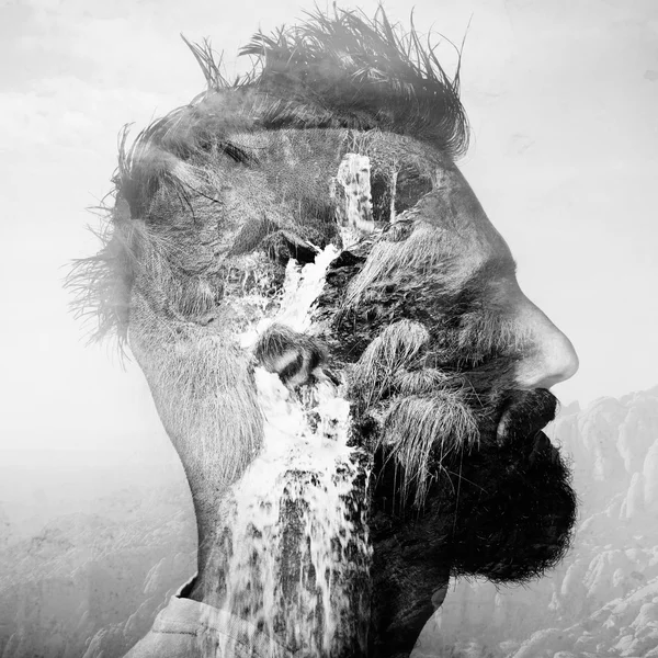 BW double exposure portrait of a man with mohawk and amountain — Stock Photo, Image