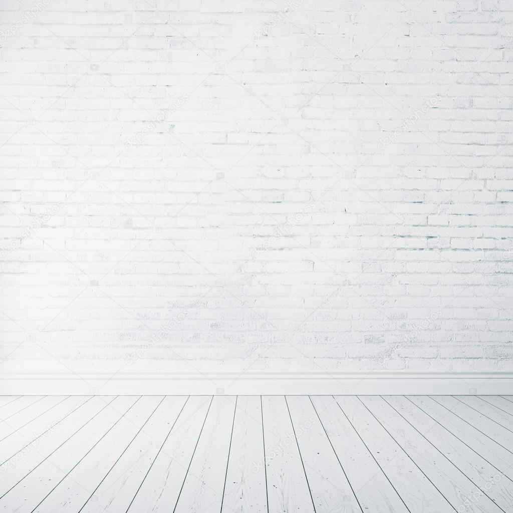 Empty part of white painted brick wall with wooden floor