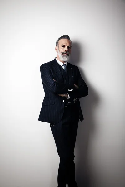 Portrait of handsome middle aged man wearing trendy suit. Vertical — Stock Photo, Image