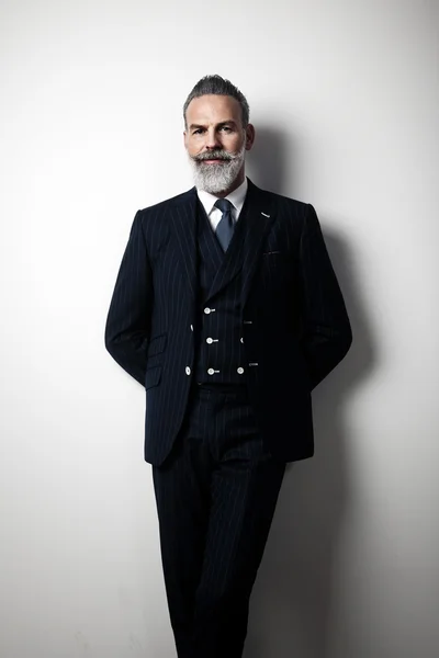 Portrait of a handsome middle aged man wearing suit. — Stock Photo, Image