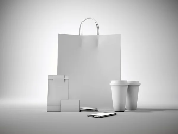 Set of white craft shopping bag, two coffee cups, business cards and generic design smartphone. Light background. 3d render — Stok fotoğraf