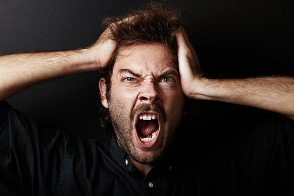 guy who grabs his head in hands