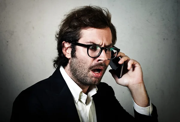 Man talking on his smartphone — Stock Photo, Image