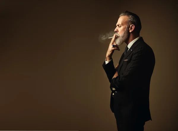 Portrait of smoking gentleman — 图库照片