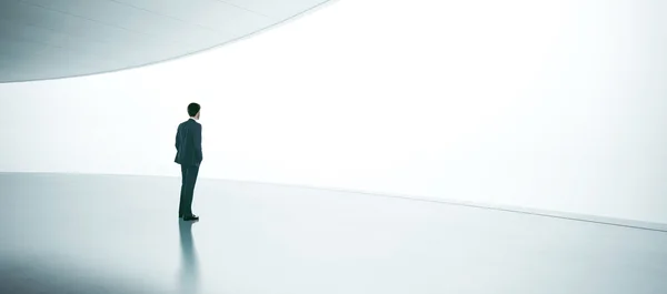 Businessman  stands in the open space — Stok fotoğraf
