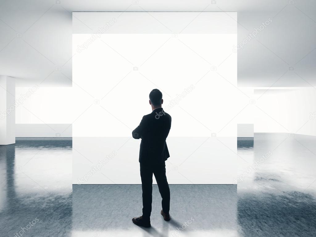 Man looking at white screen