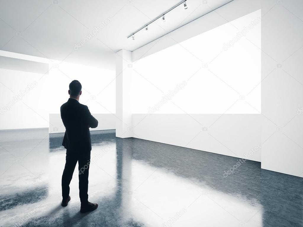 Man looking at empty screen