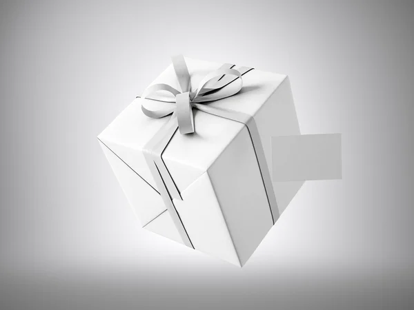 White gift box with white ribbon — Stock Photo, Image