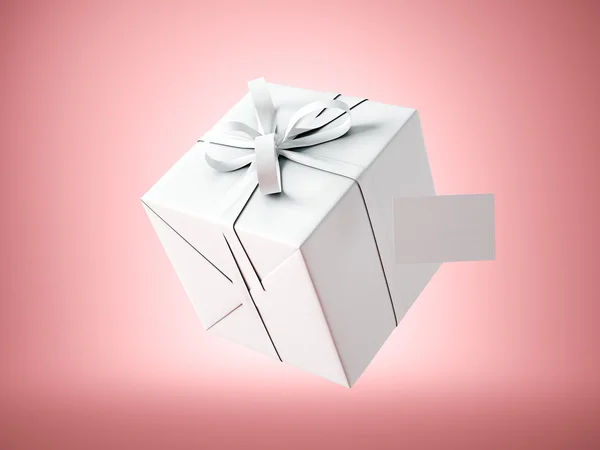 White gift box with white ribbon — Stock Photo, Image