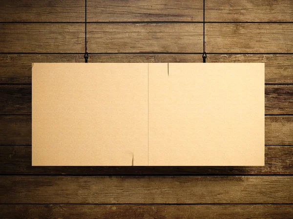 Photo of blank craft vintage canvas hanging on the wood background. 3d render — 图库照片