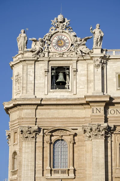 The clock on the top of the Saint Peter Basilica in Vatican Stock Image