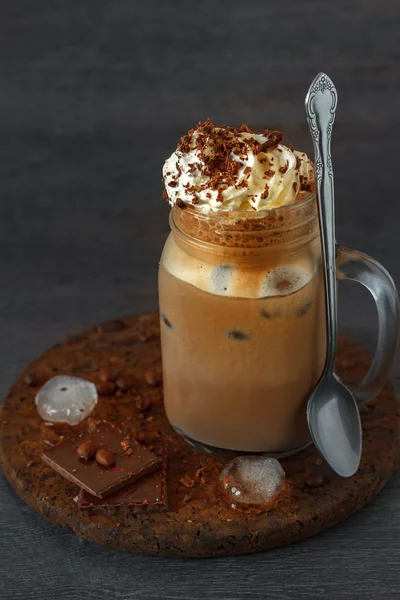 Glass of thick creamy coffee milkshake — Stock Photo, Image