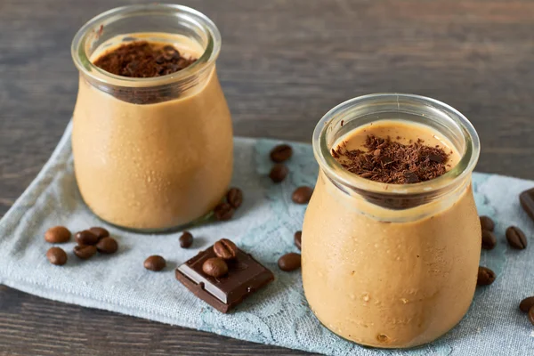 Coffee and chocolate dessert in a glass jar — Stock Photo, Image