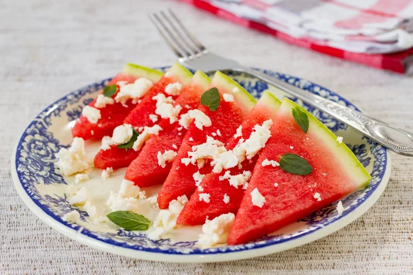 Rustic simple dish with watermelon and cheese — Stock Photo, Image