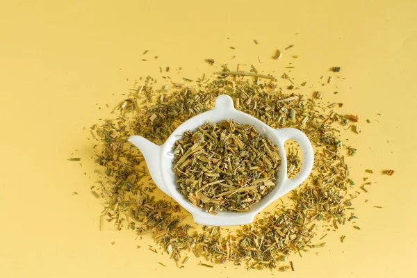 Dry Tea Medicinal Plants Teapot Shaped Plate Yellow Background — Stock Photo, Image