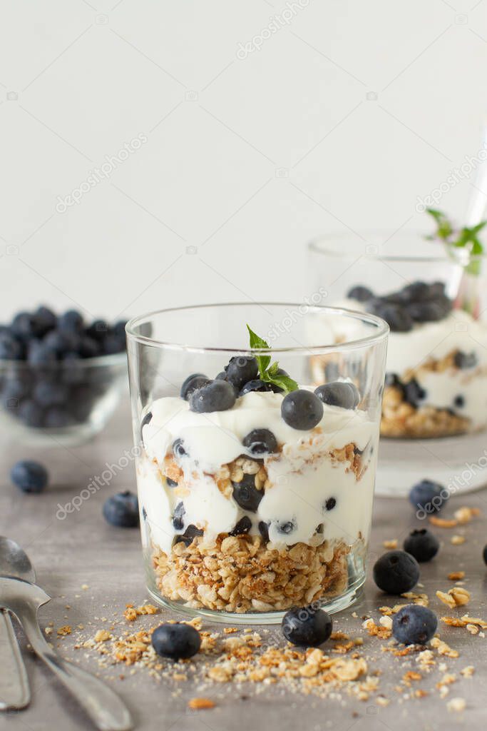 Morning healthy breakfast with muesli , yogurt and summer berries