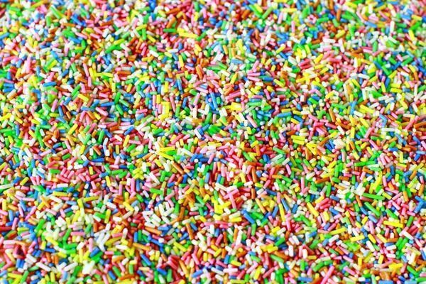 Un sacco di piccole caramelle colorate — Foto Stock