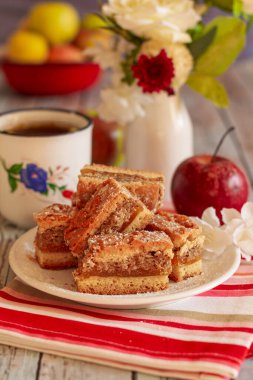 Small pieces of rustic apple coffee cake