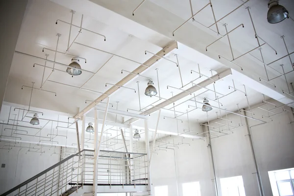 Old sprinkler system on the ceiling of the production room. — Stock Photo, Image