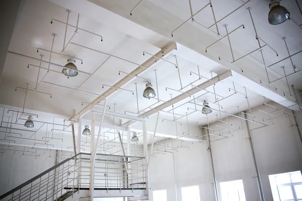 Old sprinkler system on the ceiling of the production room. — Stock Photo, Image