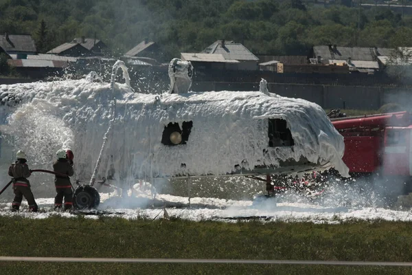 The helicopter exploded, fell to the ground and burned. Rescue exercises in a plane crash.