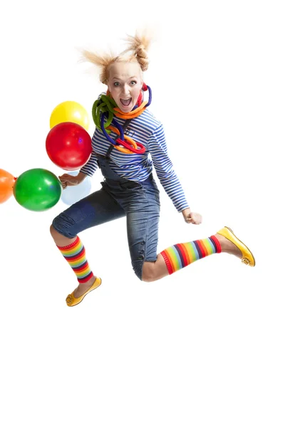 Female funny clown with balloons — Stock Photo, Image