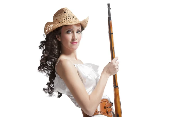 Vrouw in jurk met pistool — Stockfoto
