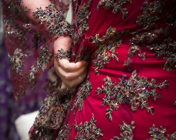 Adjusting dress on model — Stock Photo, Image