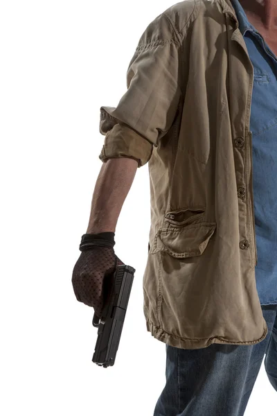 Man in black glove with a gun — Stock Photo, Image