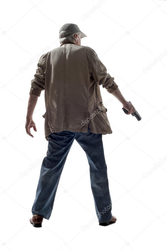 elderly man with a gun