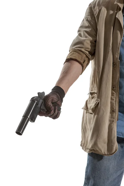 Mann in schwarzem Handschuh mit Waffe — Stockfoto