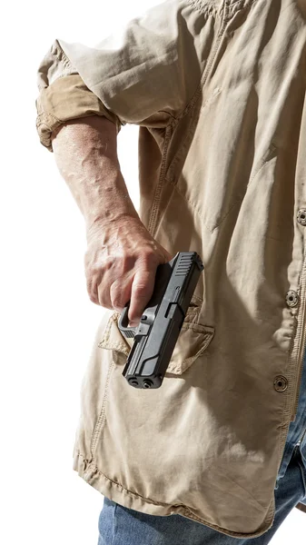 Man with a gun in his hand — Stock Photo, Image