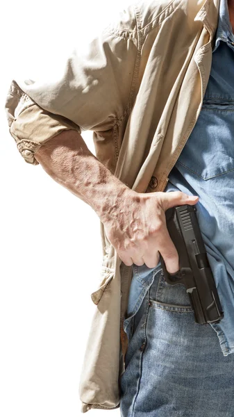 Man with a gun in his hand — Stock Photo, Image